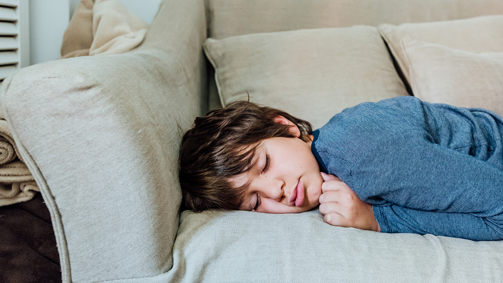 Child sleeping on couch - Sanford fit
