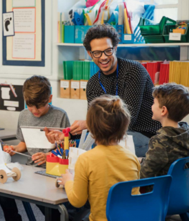 Male teacher in a classroom - Sanford fit